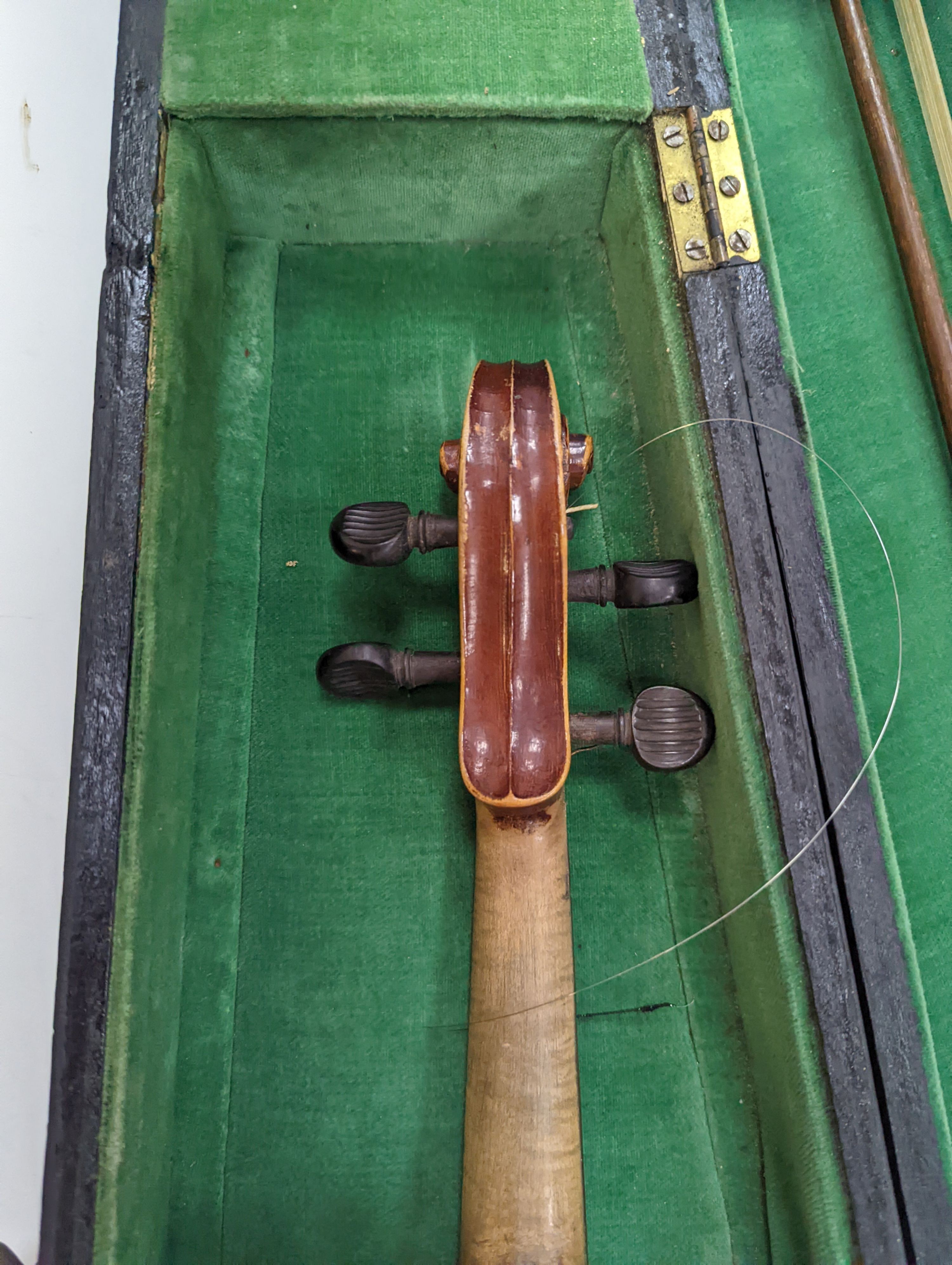 Two cased violins and bows, one with ‘Antonius Straduarius Cremonensis Faciebat Anno 17/13 Made In Czechoslovakia’ label to interior